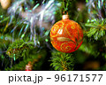 New Year and Christmas decorations, ball hangs on xmas tree close-up 96171577