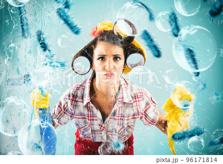 Funny housewife cleans and disinfects to keep germs away 96171814