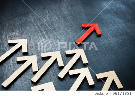 The red arrow in front of the wooden ones symbolizes leadership and management. 96171851
