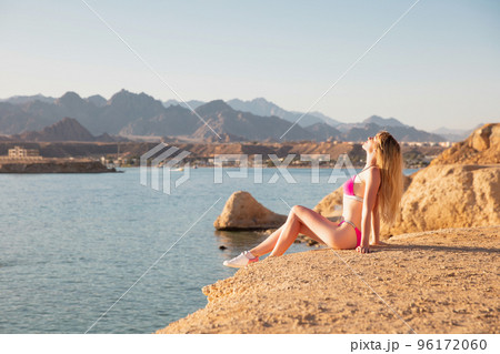 Perfect woman wearing a swimsuit Perfect woman wearing a swimsuit 96172060