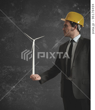 Businessman and wind turbine 96176494