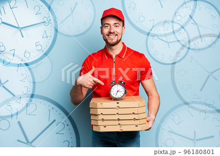 Deliveryman is punctual to deliver quickly pizzas. Cyan background Deliveryman is punctual to deliver quickly pizzas. Cyan background 96180801