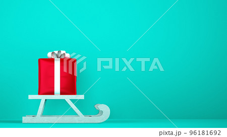 Red gift package on Christmas sleigh with cyan background 96181692