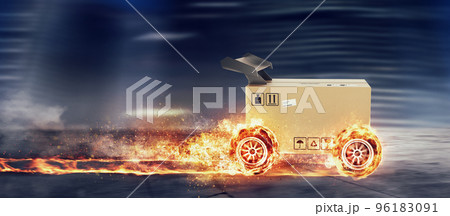 Priority Cardboard box with racing wheels on fire. Fast shipping by road. 96183091