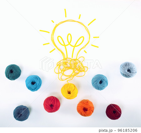 Concept of idea and innovation with wool ball that shapes a lightbulb Concept of idea and innovation with wool ball that shapes a lightbulb 96185206