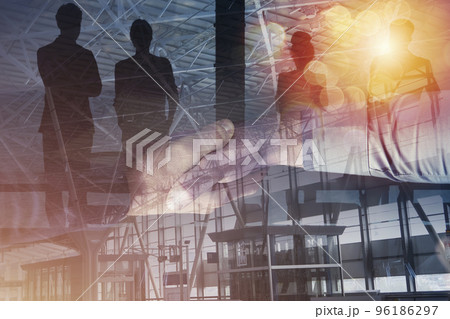 Businessmen that work together in office. Concept of teamwork and partnership. double exposure Businessmen that work together in office. Concept of teamwork and partnership. double exposure 96186297