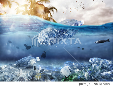Floating bottle. Problem of plastic pollution under the sea concept 96187869