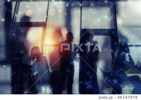 Business people collaborate together in office. Double exposure effects Business people collaborate together in office. Double exposure effects 96187978