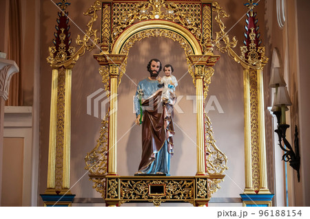 Saint Joseph hold Infant Jesus statue at Cathedral church, Chanthaburi 96188154