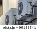 office air conditioners on the wall of the building 96189541