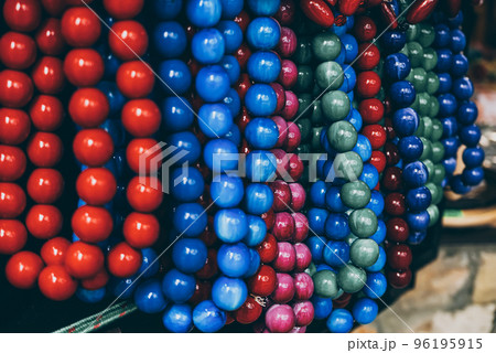 Wooden red beads on the market 96195915