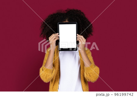 Unrecognizable african american child hiding behind digital tablet, mockup 96199742