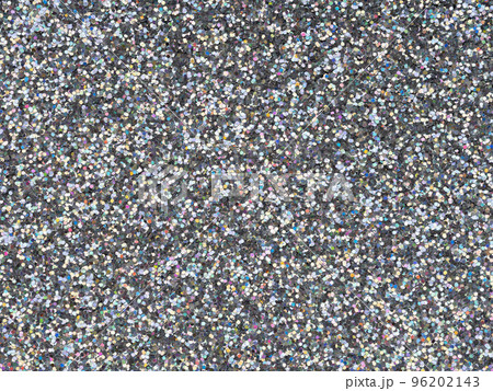 Holographic bright light grey glitter texture. Background or pattern of sparkling shiny glitter for decoration and design of unusual Christmas, New Year, xmas gift card or other holiday pictures. 96202143