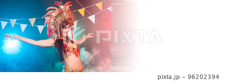 Banner Holidays, party cabaret, dance and nightlife concept - Beautiful woman dressed for carnival night copy space Banner Holidays, party cabaret, dance and nightlife concept - Beautiful woman dressed for carnival night copy space 96202394