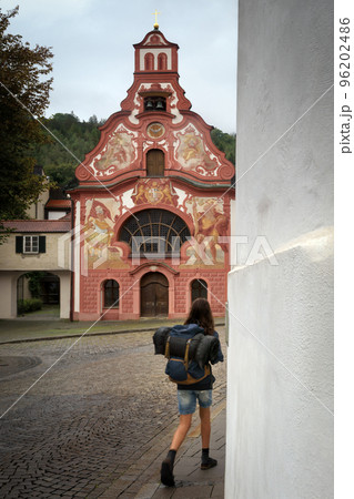 View of the traditional painted bavarian church of the holy spirit in the village of Fussen View of the traditional painted bavarian church of the holy spirit in the village of Fussen 96202486