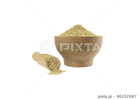 quinoa in wooden bowl and scoop isolated on white background. nutrition. food ingredient. quinoa in wooden bowl and scoop isolated on white background. nutrition. food ingredient. 96202887