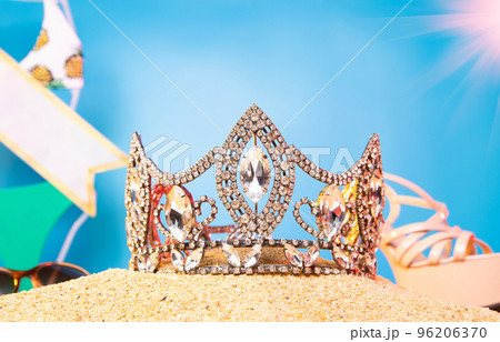 Desert Sand Ocean wind Diamond Crown put into Deep blue sky nature hot tropical island for Miss Beauty Pageant Contest Competition, bikini sash high heel shoes hang on outing trip camping background 96206370