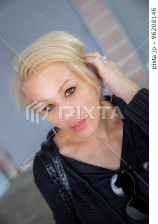 Pretty blonde woman portrait with hand Pretty blonde woman portrait with hand 96208146