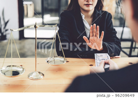 Corruption, law concept, government officials are refusing to accept corrupt payments from private equity owners who want to benefit their concessions. Corruption, law concept, government officials are refusing to accept corrupt payments from private equity owners who want to benefit their concessions. 96209649