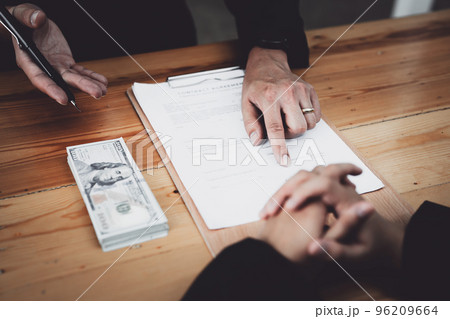 Corruption concept, law, civil servants sign government project documents and receive corruption money from private companies. Corruption concept, law, civil servants sign government project documents and receive corruption money from private companies. 96209664