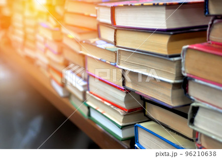 Old used books are on table in bookstore. Lot of books in stack at book flea market. Background. Old used books are on table in bookstore. Lot of books in stack at book flea market. Background. 96210638