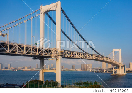 Sunny view of the Rainbow Bridge and cityscape Sunny view of the Rainbow Bridge and cityscape 96212002