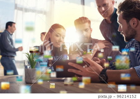 Businessperson in office connected on internet network. concept of partnership and teamwork Businessperson in office connected on internet network. concept of partnership and teamwork 96214152