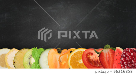 Colourful banner of fruits on blackboard background 96216858