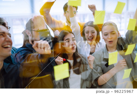 Young business team people brainstorm on corporate project together write strategy tasks 96225967