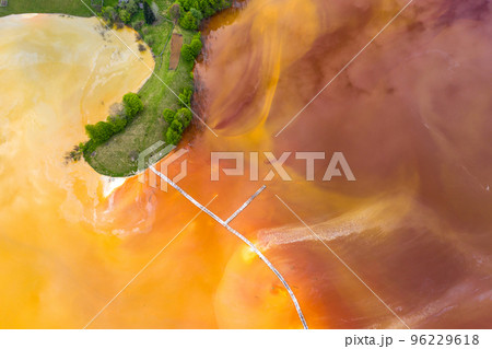 Aerial view of acid colorful mine waste waters Aerial view of acid colorful mine waste waters 96229618