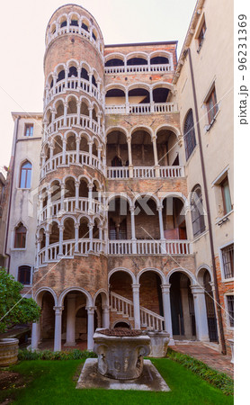 Old medieval stone spiral staircase in Venice. Old medieval stone spiral staircase in Venice. 96231369