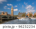 Famous Big Ben with bridge over Thames and tourboat on the river in London, England, UK 96232234