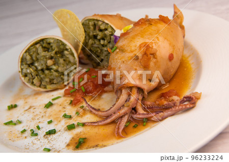 RECIPE FOR STUFFED SQUID, RIZOTTO AND SPINACH PESTO, HOMEMADE TOMATO SAUCE RECIPE FOR STUFFED SQUID, RIZOTTO AND SPINACH PESTO, HOMEMADE TOMATO SAUCE 96233224