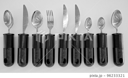Ergonomic cutlery for the elderly, with arthritis, Parkinson's, apoplexy and the disabled - 3D Rendering 96233321