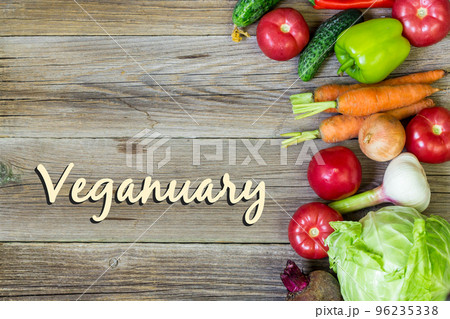Flat lay with many raw vegetables. Vegetarian and vegan diet month in january called Veganuary. Flat lay with many raw vegetables. Vegetarian and vegan diet month in january called Veganuary. 96235338