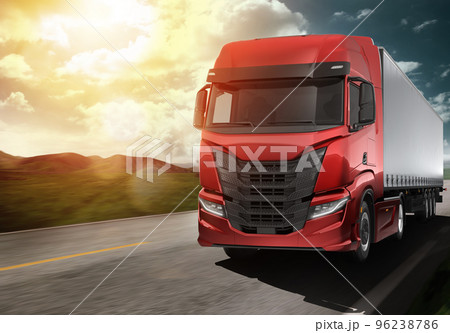 Red modern truck moving fast on the road at sunset with natural landscape 96238786