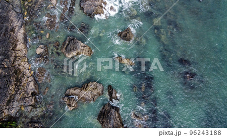 A lot of boulders in the sea. Coastal cliffs of the North Atlantic. Seaside beautiful nature. Dramatic seascape of the north of Europe. Aerial photo. Drone point of view. 96243188