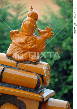 Decorative finial on a roof at the Fo Guang Shan Nan Tien Temple, a Buddhist temple at Berkeley near Wollongong, Australia. 96243500