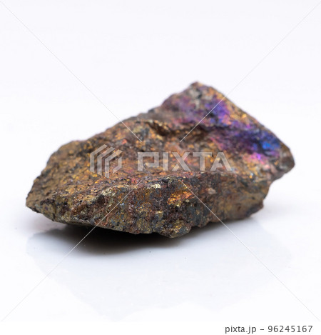 Natural stone chalcopyrite on a white background. Mineral of golden color on a white background 96245167