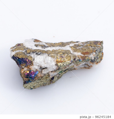 Natural stone chalcopyrite on a white background. Mineral of golden color on a white background Natural stone chalcopyrite on a white background. Mineral of golden color on a white background 96245184