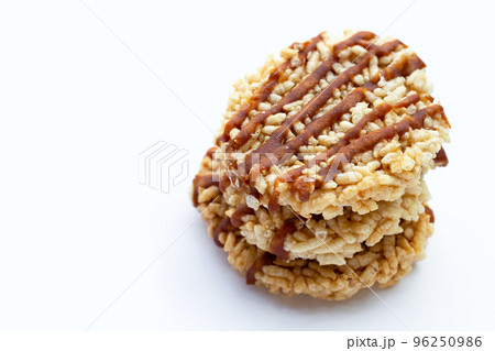 Rice cracker with coconut palm sugar on white 96250986