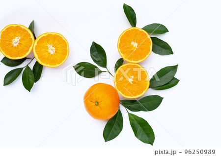 Orange fruit with green leaves on white background. 96250989