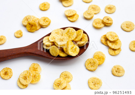 Banana slice chips on white background. 96251493