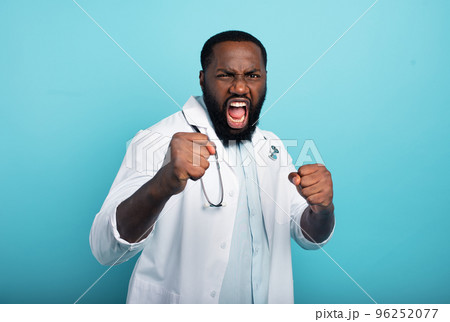 Brave medic fight against covid-19 coronavirus. Blue background Brave medic fight against covid-19 coronavirus. Blue background 96252077