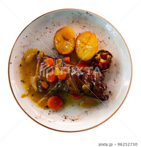Fresh portion of ribs garnished with vegetables Fresh portion of ribs garnished with vegetables 96252730