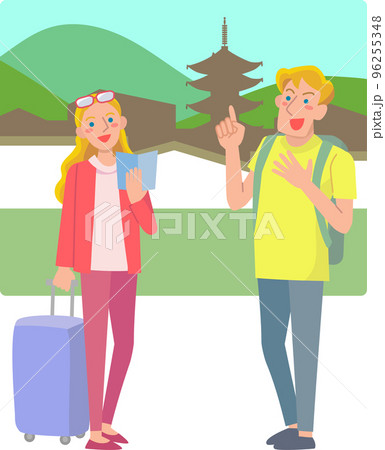ガイドブックを手に古都を旅する外国人観光客の男女 96255348