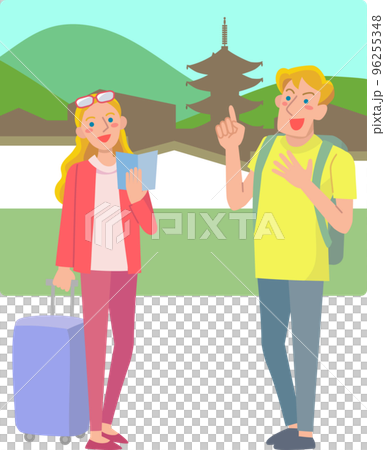 ガイドブックを手に古都を旅する外国人観光客の男女 96255348
