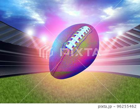 American Football flying in a glowing stadium background 96255462