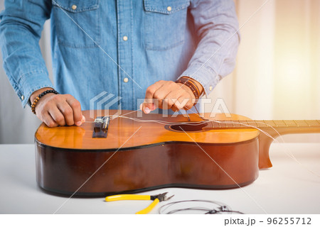 restring classical guitar restring classical guitar 96255712