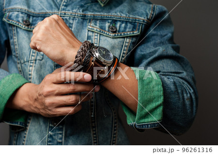 bracelets and watch on the wrist bracelets and watch on the wrist 96261316